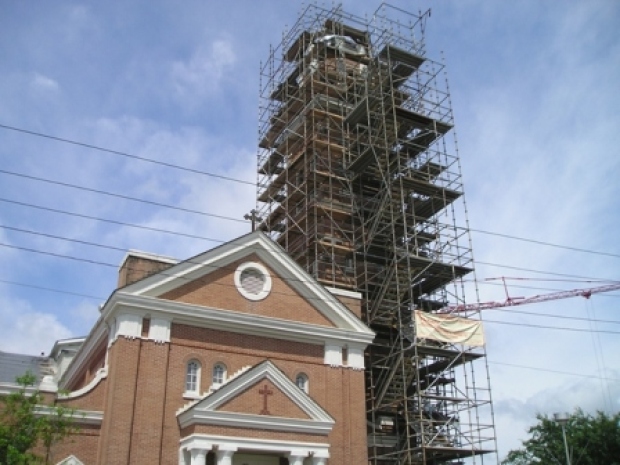 The project included re-roofing the church building, masonry repairs, waterproofing, stain glass window restoration, new storm sashes, replication of exterior doors, plaster repairs, site drainage and new exterior lighting protection systems.